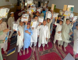 Lahore, Pakistan - Participating in Mobile Food Rescue Program by Distributing Goodie Bags to Madrasa Students, Homeless & Less Privileged Children