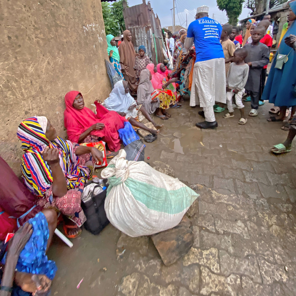 Abuja, Nigeria - Participating in Mobile Food Rescue Program by Distributing Candy & Footwear to Less Privileged Children & Rice Bags to Less Privileged People