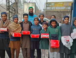 Lahore, Pakistan - Participating in Mobile Food Rescue Program by Preparing, Packaging & Distributing Hot Lunches with Snacks, Chocolates & Juice to 40+ Less Privileged Children