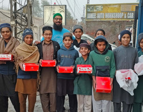 Lahore, Pakistan - Participating in Mobile Food Rescue Program by Preparing, Packaging & Distributing Hot Lunches with Snacks, Chocolates & Juice to 40+ Less Privileged Children