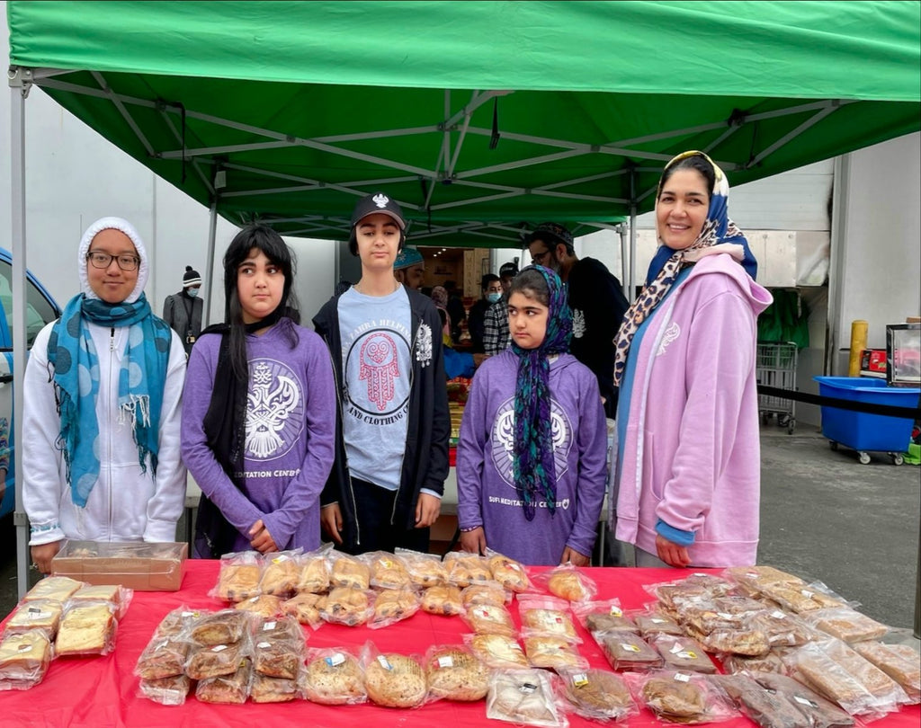 Vancouver - Honoring Holy Eid al-Adha & Shahadat/Witnessing of Sayyidina Uthman al Ghani Jami’ull Quran al Majeed (Compiler of Holy Quran) ع Distributing Sweet Eid Treats to Refugee Families at Muslim Food Bank