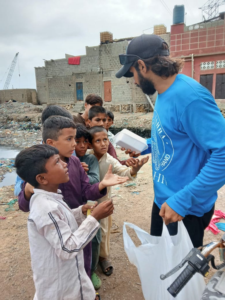 Karachi, Pakistan - Honoring Third Day of Holy Month of Muharram by Distributing Hot Meals to Local Community's Homeless & Less Privileged People
