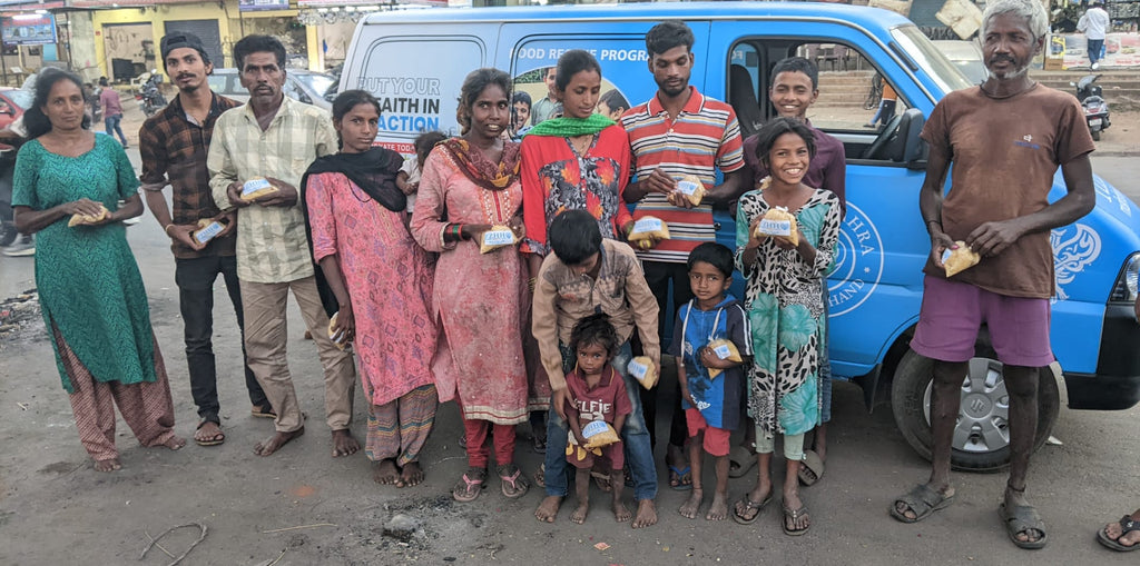 Hyderabad, India - Participating in Mobile Food Rescue Program by Distributing Hot Meals (Mutton Biryani) to Local Community's Less Privileged & Disabled People