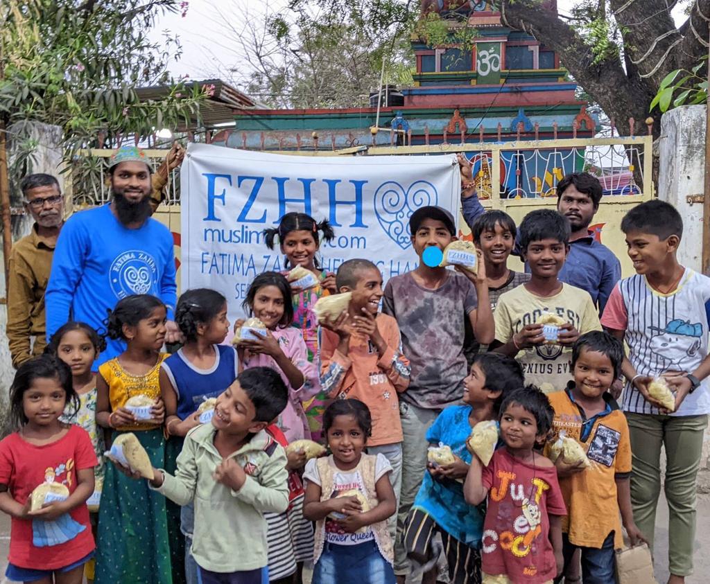 Hyderabad, India - Participating in Mobile Food Rescue Program by Distributing Hot Meals to Less Privileged Children & Homeless Families