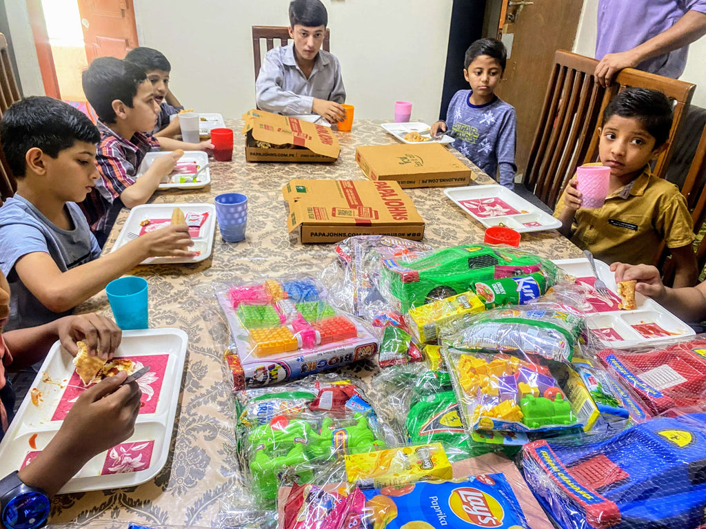 Lahore, Pakistan - Participating in Orphan Support Program & Mobile Food Rescue Program by Serving Hot Meals & Distributing Gift Bags to Beloved Orphans at Local Community's Orphanage