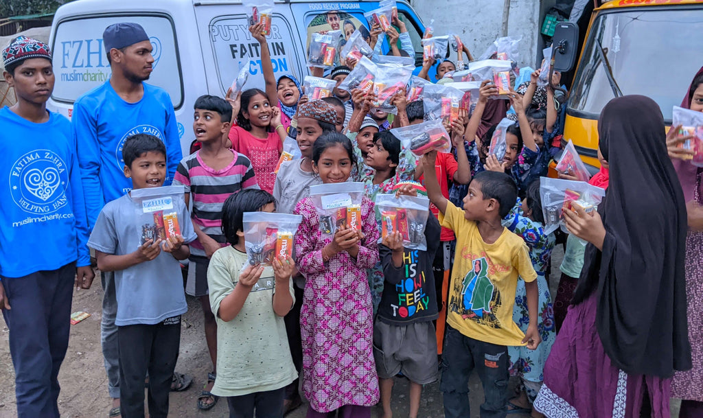 Hyderabad, India - Participating in Mobile Food Rescue Program by Distributing 150+ Snack Packs with Fruits, Juice, Cookies, Chocolates & Bakery Items to Madrasa Students, Homeless & Less Privileged Families