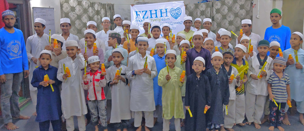 Hyderabad, India - Participating in Mobile Food Rescue Program by Distributing Snacks, Juices & Blessed Birthday Cakes to Madrasa Students