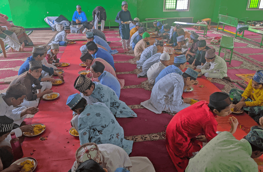 Hyderabad, India - Participating in Mobile Food Rescue Program by Serving Hot Meals to 150+ Less Privileged Madrasa Students