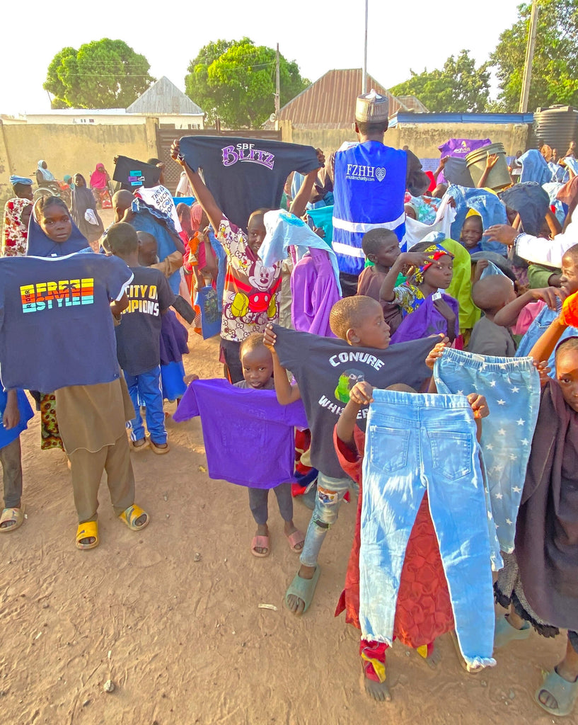 Abuja, Nigeria - Participating in Orphan Support Program & Mobile Food Rescue Program by Distributing Clothes to 200+ Less Privileged Children & Rice Bags to 10+ Less Privileged Adults Living at Disabilities Camp