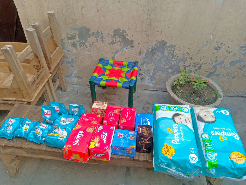 Lahore, Pakistan - Participating in Orphan Support Program & Mobile Food Rescue Program by Distributing Essential Pediatric Consumable Supplies, Snacks & Candies to Local Community's Orphanage Serving Blind Children