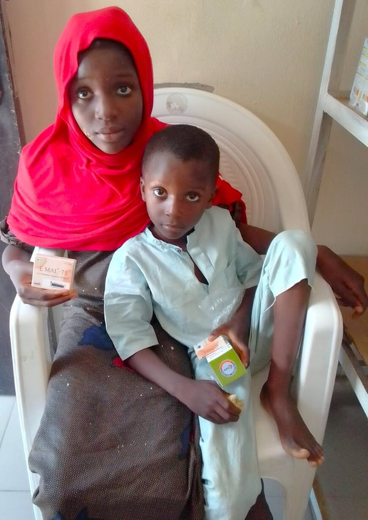 Abuja, Nigeria - Participating in Pediatric Medical Outreach Program & Mobile Food Rescue Program by Distributing Essential Pediatric Consumable Supplies & Administering Anti-Malaria Medications to Less Privileged Children at Local Health Center