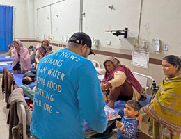 Lahore, Pakistan - Participating in Mobile Food Rescue Program by Distributing Essential Pediatric Medical Equipment & Goodie Bags Filled with Snacks & Candies at Local Community's Hospital Sserving Less Privileged Children