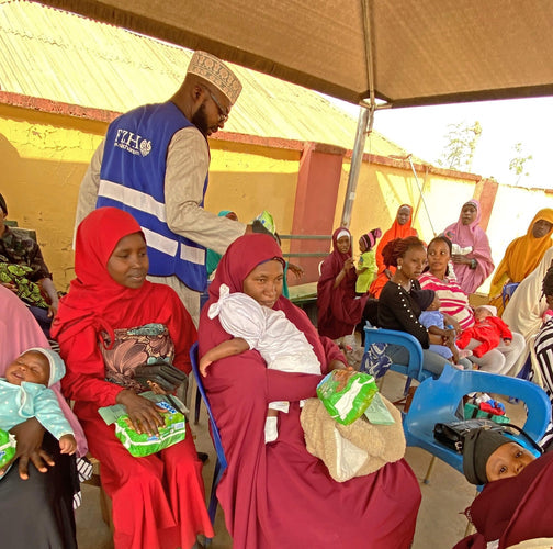 Abuja, Nigeria - Participating in Pediatric Medical Outreach Program & Mobile Food Rescue Program by Distributing Diapers, Medications for Anti-Malaria & Typhoid and Administration Supplies to 40+ Babies & Nursing Mothers at Local Health Center