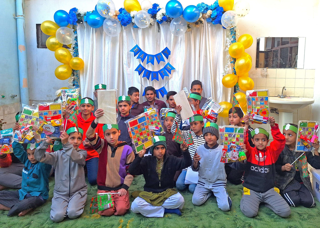 Lahore, Pakistan - Participating in Orphan Support & Mawlid Support Programs by Celebrating ZikrAllah & Mawlid an Nabi ﷺ, Serving Hot Meals with Birthday Cake & Distributing Blessed Goodie Bags with Gifts to Beloved Orphans & Less Privileged Children