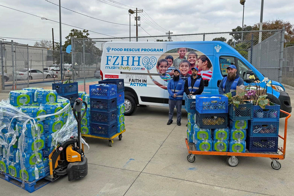 Los Angeles, California - Participating in Mobile Food Rescue Program by Distributing Over 6000+ Bottles of Water & 600+ lbs. of Fresh Meats, Fruits & Vegetables to Local Community's Breadline Serving Less Privileged Families