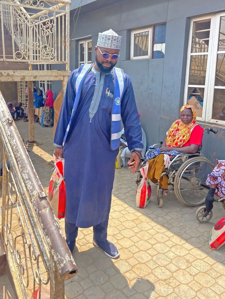 Abuja, Nigeria - Participating in Mobile Food Rescue Program by Distributing 10+ Rice Bags to Less Privileged Women Living with Disabilities and 10+ Footwear & Lots of Candies to Less Privileged Children