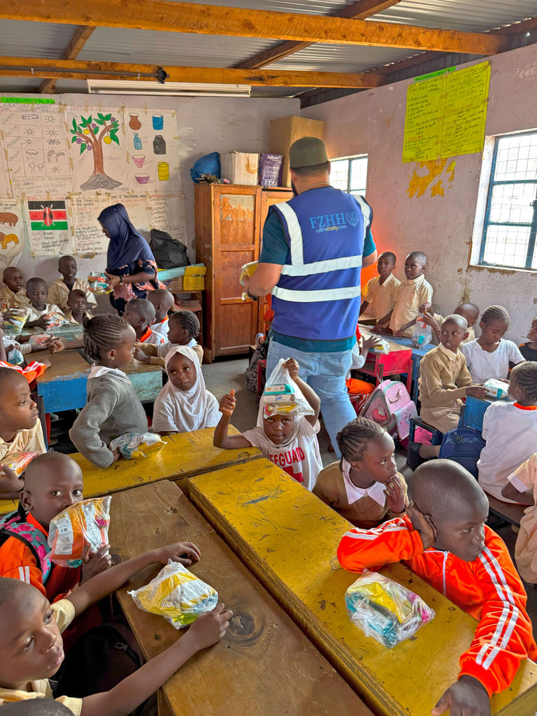 Nairobi, Kenya - Participating in our Orphan Support Program by Distributing Goodie Bags Filled with Snacks, Cookies & Candies to 150+ Beloved Orphans & Less Privileged Children