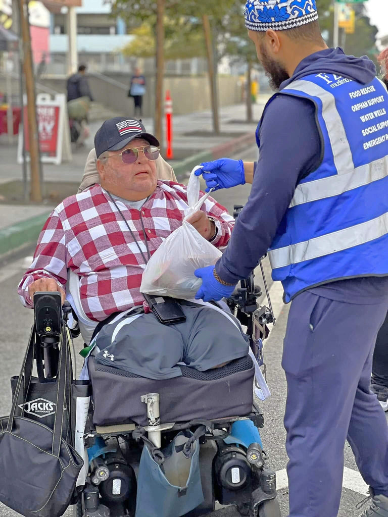 Los Angeles, California - Participating in Mobile Food Rescue Program by Serving 100+ Hot Meals with Desserts and Water & Distributing Goodie Bags with Essential Groceries and Supplies to Local Community's Homeless & Less Privileged People