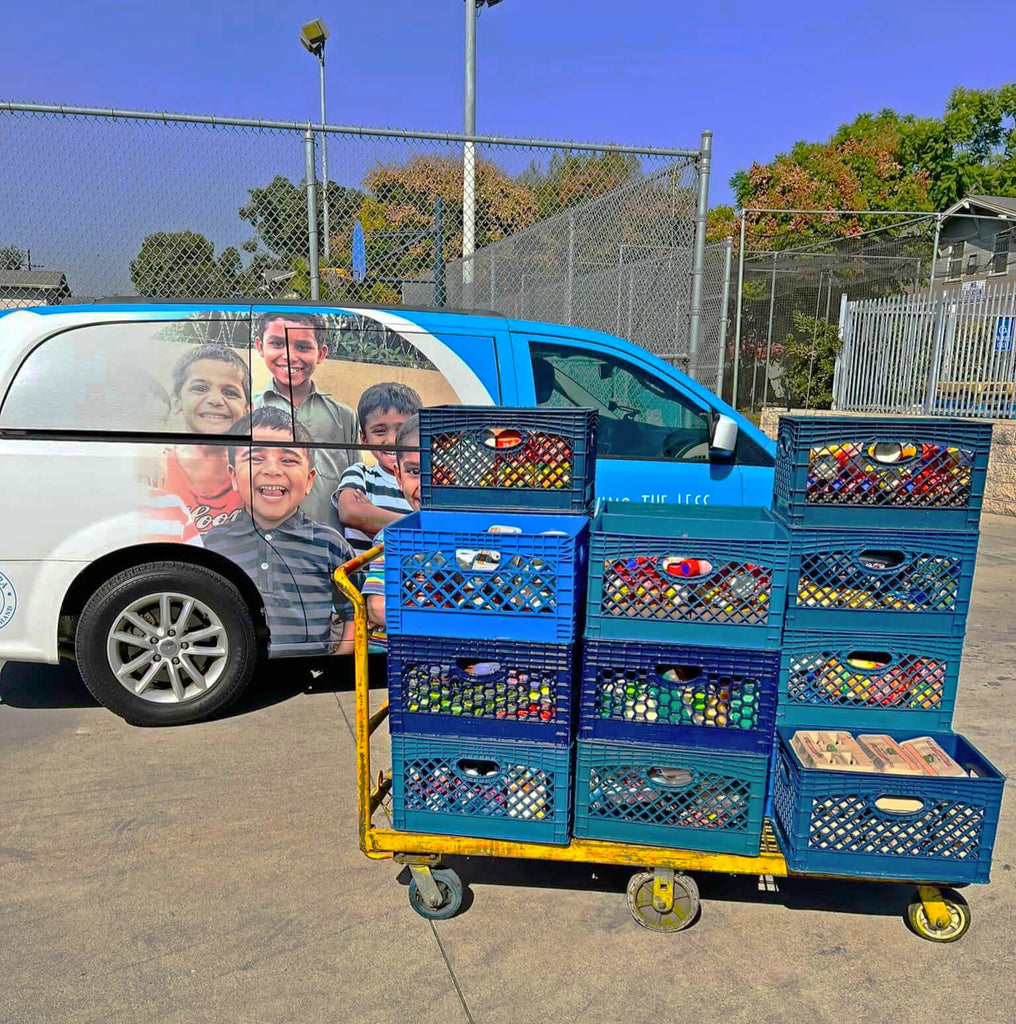 Los Angeles, California - Participating in Mobile Food Rescue Program by Rescuing & Distributing Over 800+ lbs. of Fresh Meats, Dairy, Eggs, Juices & Essential Foods to Local Community's Breadline Serving Less Privileged Families