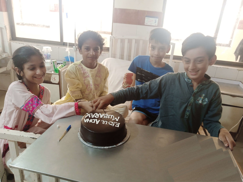 Pakistan - Honoring Holy Tenth Day of Dhul Hijjah & Holy Eid al-Adha by Serving Blessed Cake & Distributing Goodie Bags to Admitted Children at Pediatric Ward of Children's Hospital