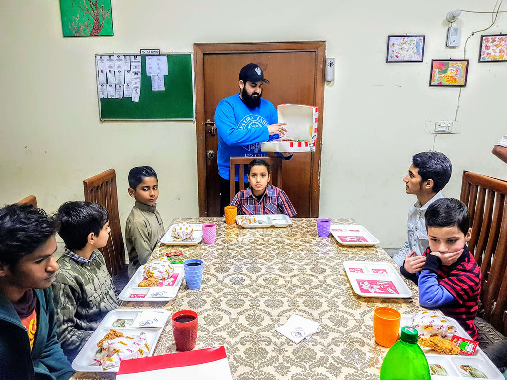 Lahore, Pakistan - Participating in Mobile Food Rescue Program by Serving Hot Meals & Administering Essential Vitamin Supplements to Beloved Orphans at Local Community's Orphanage