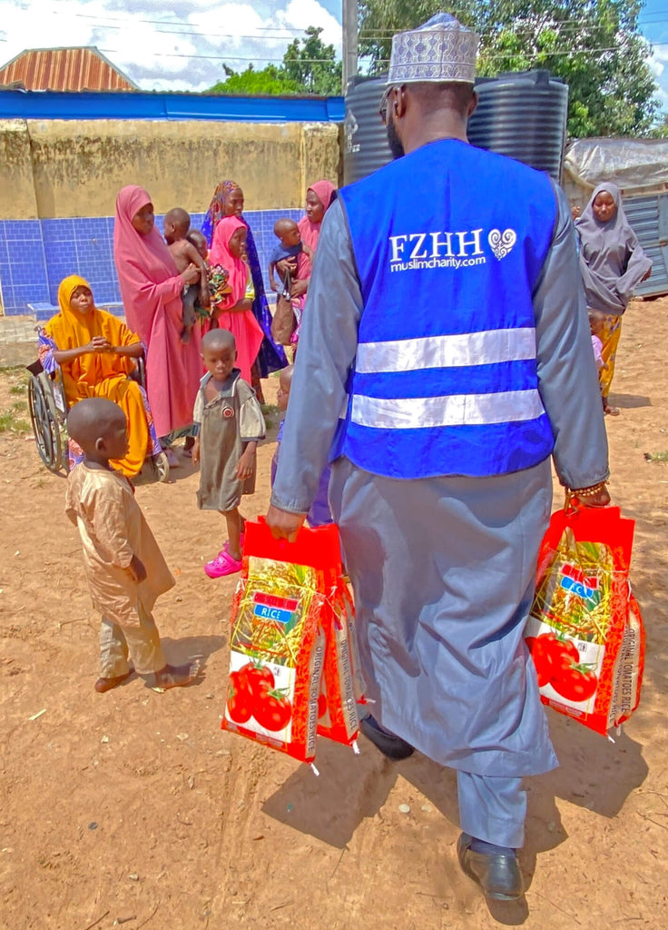 Abuja, Nigeria - Participating in Mobile Food Rescue Program by Distributing Candy & Footwear to Less Privileged Children & Rice Bags to Less Privileged Women Living with Disabilities