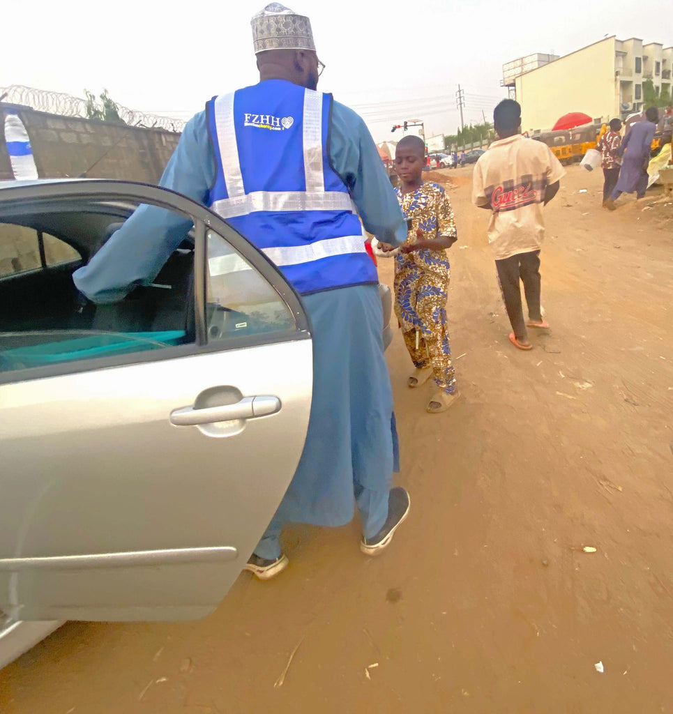 Abuja, Nigeria - Participating in Mobile Food Rescue Program by Preparing, Packaging & Distributing 30+ Hot Meals to Less Privileged Children