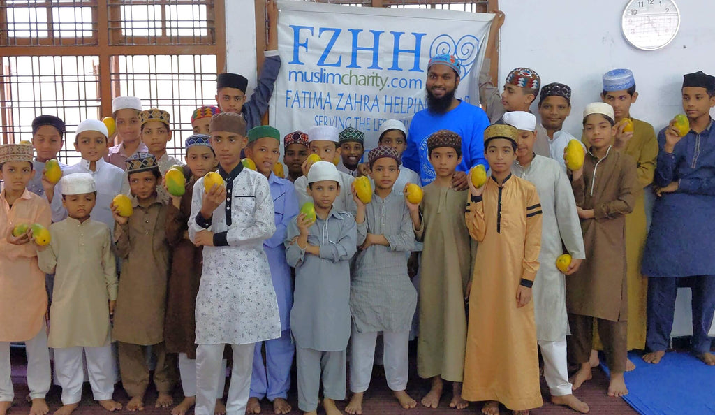 Hyderabad, India - Participating in Mobile Food Rescue Program by Distributing Fresh Mangoes to Local Community's Madrasa/School Children, Less Privileged Children & Families