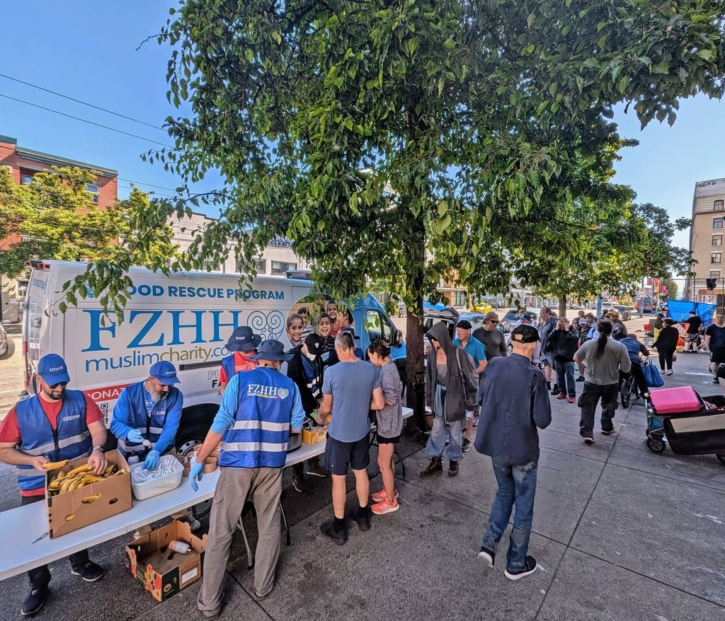 Vancouver, Canada - Participating in Mobile Food Rescue Program by Serving Hot Breakfasts & Lunches with Drinks, Desserts & Fresh Fruits to Local Community's Homeless & Less Privileged People