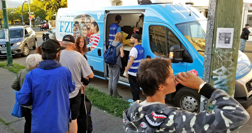 Vancouver, Canada - Participating in Mobile Food Rescue Program by Distributing Hot Deli Sandwiches with Drinks, Desserts & Fresh Fruits to Local Community's Homeless & Less Privileged People