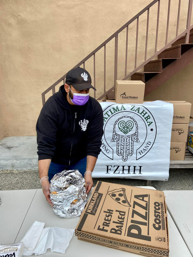 Honoring Shahadat/Martyrdom of Sayyidina Imam Jafar as Sadiq (AS) by Serving Warm Pizzas & Distributing Socks at Local Community Center – LA