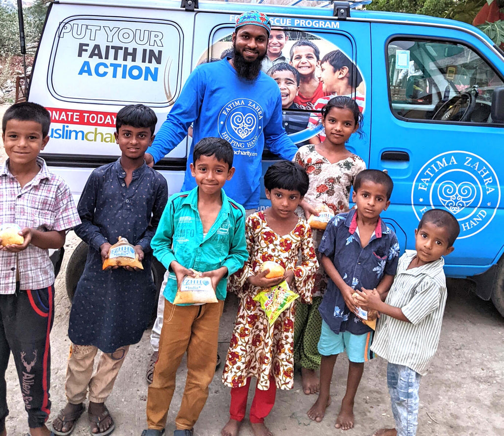 Hyderabad, India - Participating in Mobile Food Rescue Program by Distributing Hot Meals to Local Community's Less Privileged Children, Families & Seniors