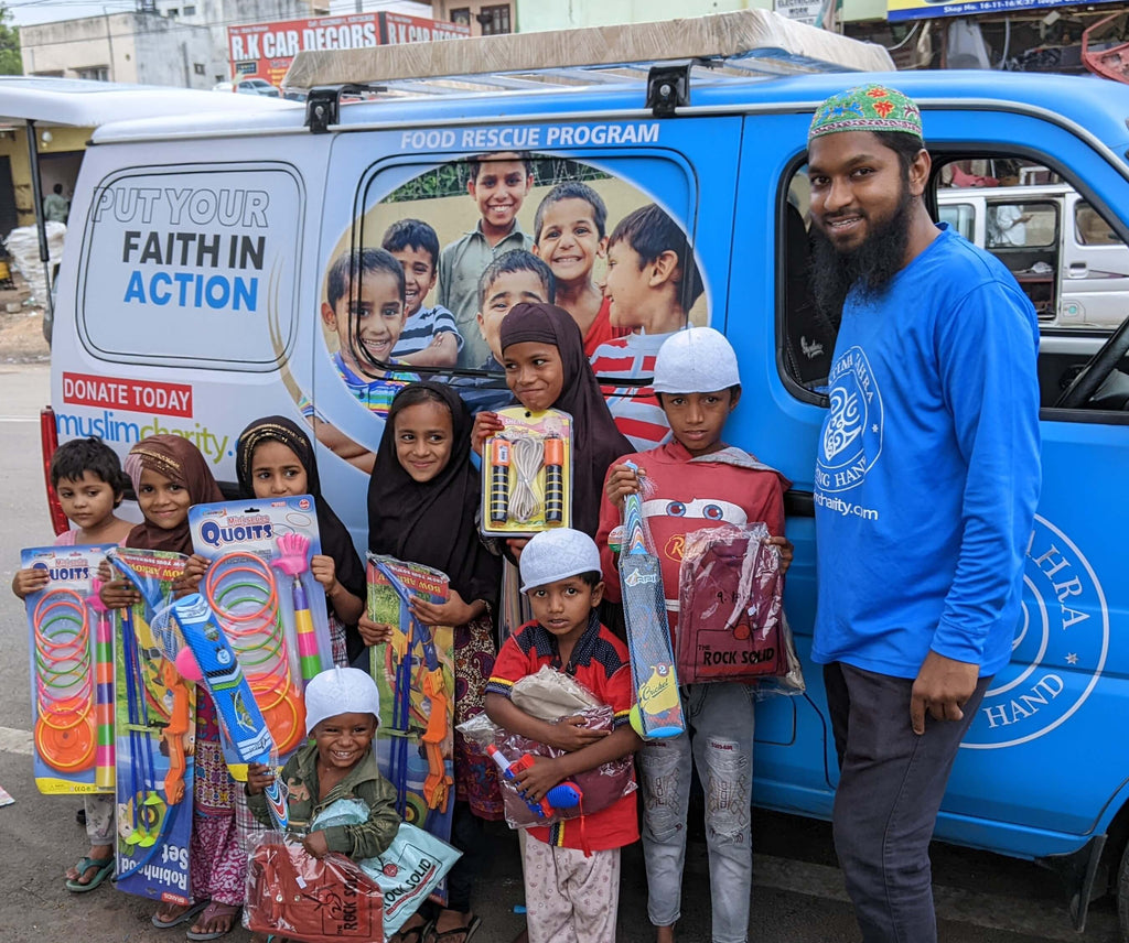 Hyderabad, India - Participating in Mobile Food Rescue Program by Collecting & Distributing Eid Gifts to Local Community's Homeless & Less Privileged Families