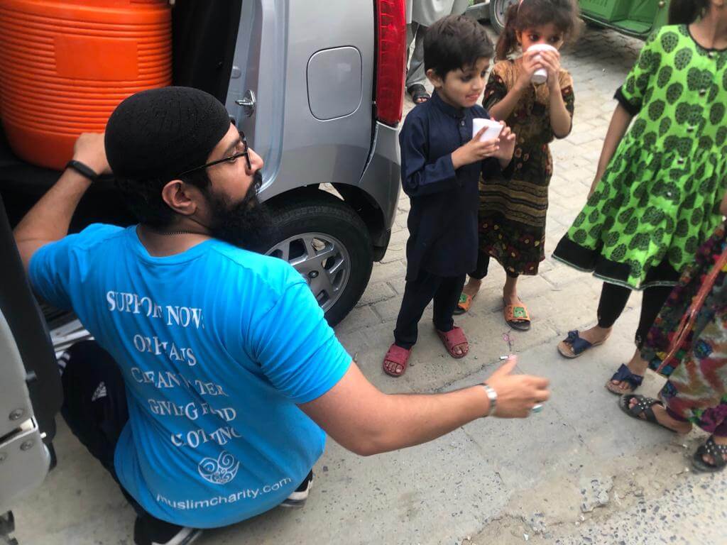 Lahore, Pakistan - Participating in Mobile Food Rescue Program by Serving Hot Haleems and Cold Water & Juices to People in Need