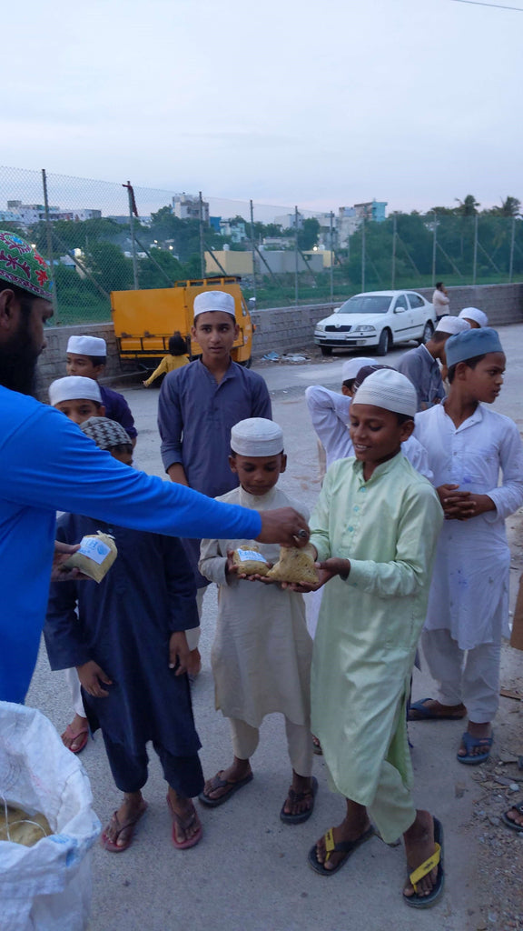 Hyderabad, India - Participating in Mobile Food Rescue Program by Distributing Hot Meals to Local Community's Madrasa/School Children, Homeless & Less Privileged Families