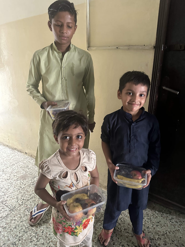 Lahore, Pakistan - Participating in Orphan Support Program & Mobile Food Rescue Program by Distributing Fresh Fruit Boxes to Beloved Orphans & Less Privileged Children