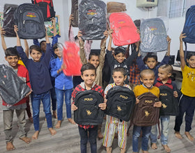 Lahore, Pakistan - Participating in Orphan Support Program & Mobile Food Rescue Program by Serving Hot Lunch & Distributing Goodie Bags & 45+ Brand New School Bags to 110+ Beloved Orphans & Less Privileged Children