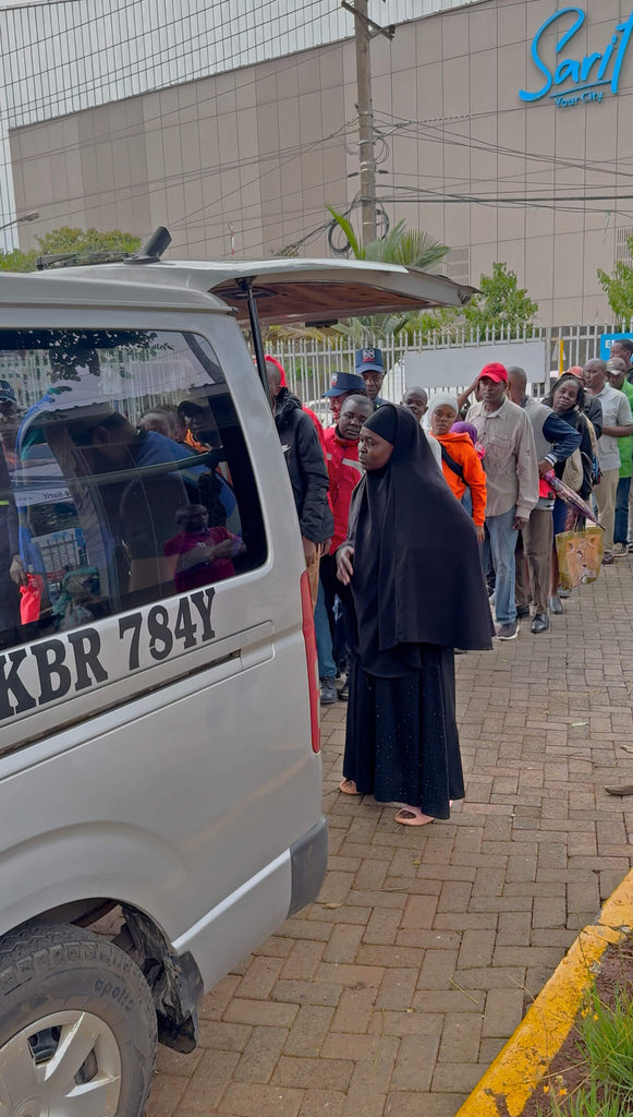 Nairobi, Kenya - Participating in Mobile Food Rescue Program by Distributing 2112+ lbs. of Maize Meals to 480+ Less Privileged Children & Adults