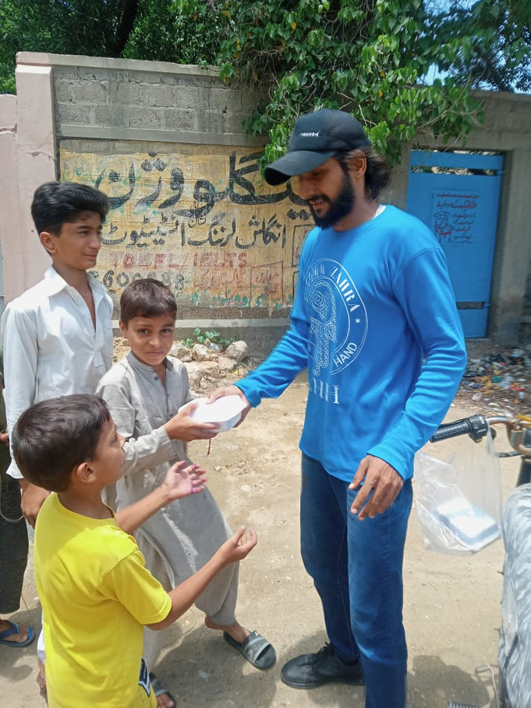 Karachi, Pakistan - Honoring Ninth Day of Holy Month of Muharram & Eve of Ashura by Distributing Hot Meals to Local Community's Homeless & Less Privileged People