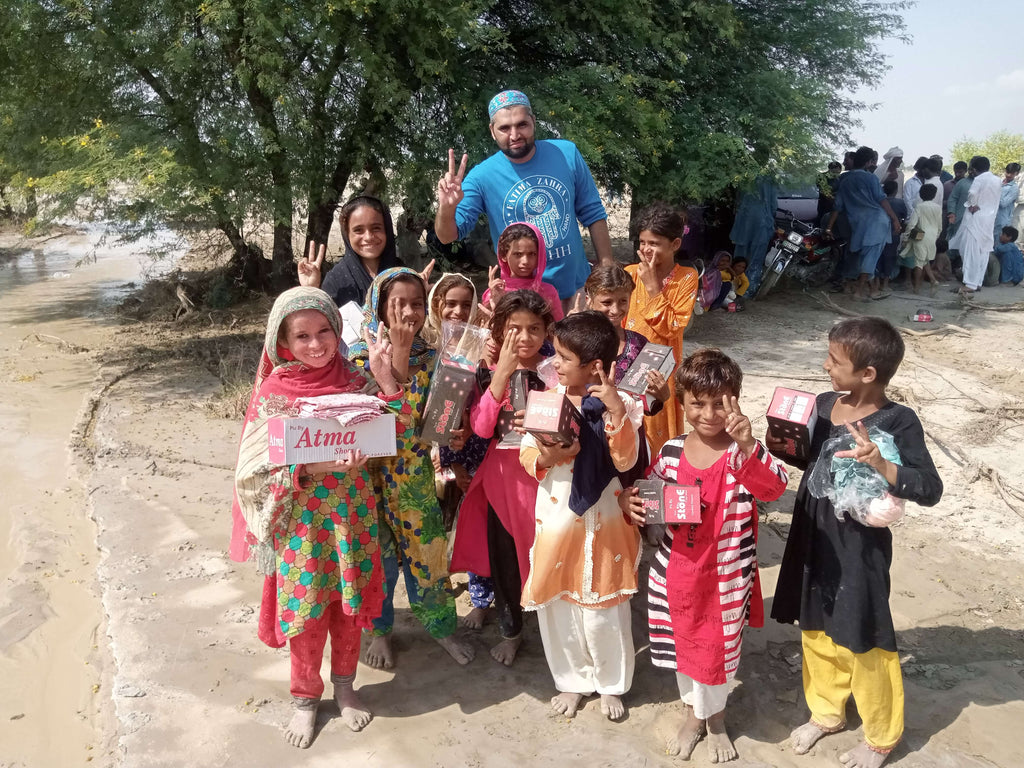Punjab, Pakistan - Honoring Wiladat/Holy Birthday of Sayyidina Imam Mūsā al-Kāẓim ع by Distributing New Clothes & Shoes to Flood Victims Including Orphan Children