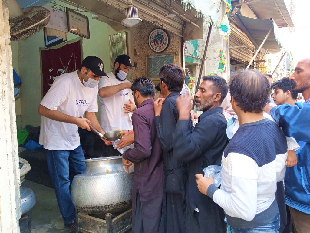 Distributing Hot Meals at Shrine of Bibi Pak Daman (AS) – PK