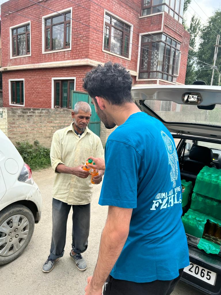 Kashmir - Honoring Ashura/Tenth Day of Holy Month of Muharram & Shahadat/Martyrdom of Sayyidina Imam Hussein (AS) & Martyrs (AS) of Karbala by Distributing 240+ Bottles of Fresh Juice to Attendees at Community's Local Mosque & Madrasa/School
